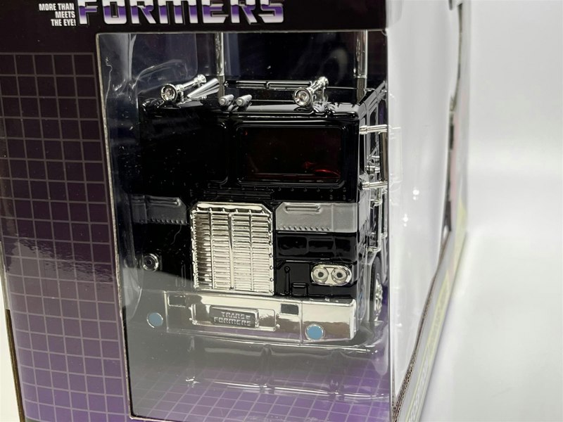 a toy car in a box