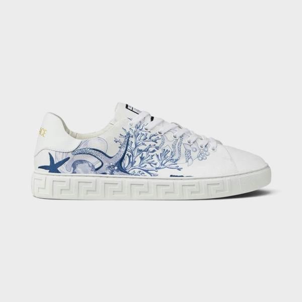 Supplied Fashion Versace Coral Theatre Greca sneakers in white leather with blue marine-themed print and side motif.