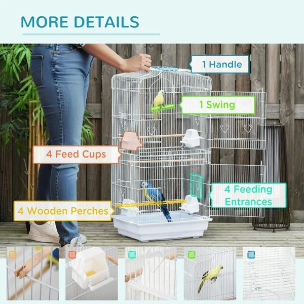 White metal bird cage with handle, swing, feeding cups, and wooden perches