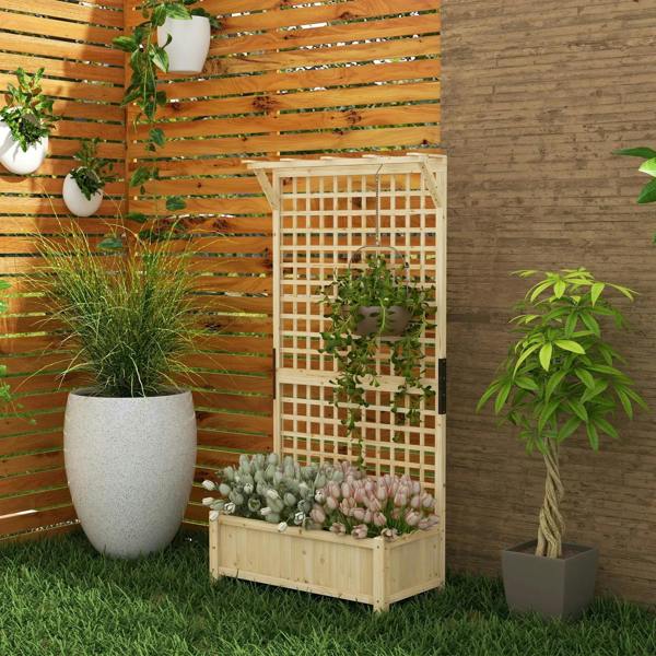Natural wood raised planter with trellis in a garden corner, potted plants around