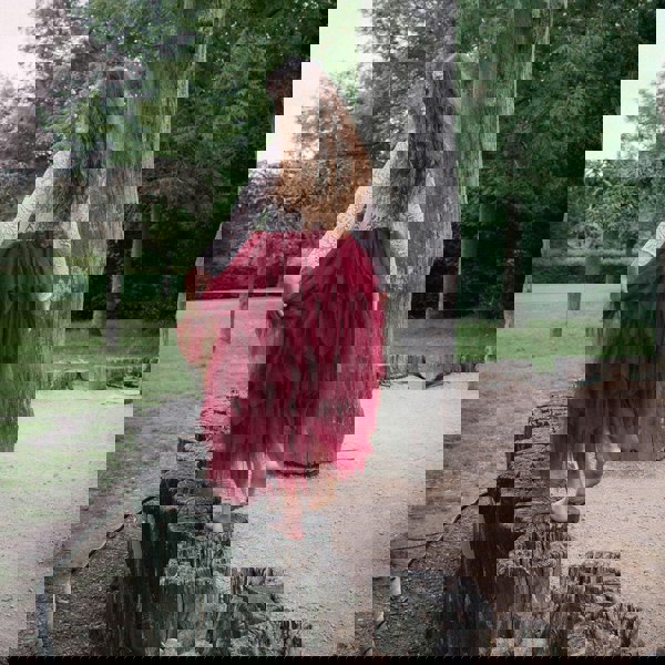 flower girl in a park wearing a Bohemian Spirit Dress 