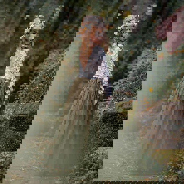 pretty flower girl looking back