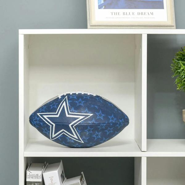 White open cube compartment in a 9-cube storage unit with a blue star cushion