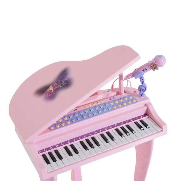 Pink mini electronic keyboard with colorful panel and black-and-white keys