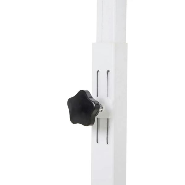 Height adjustment hand knob on white support column for over-bed table