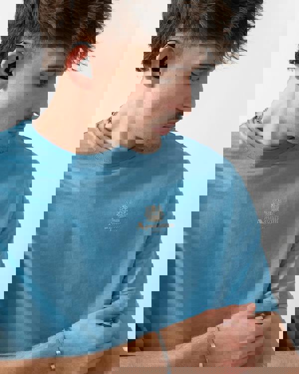 close up shot of a model wearing an Aquascutum Mens Small Logo T-Shirt in Avio 18