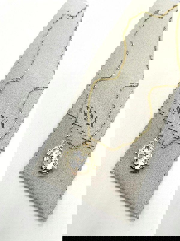 SVNX Ivory Stone Clock Pendant Necklace