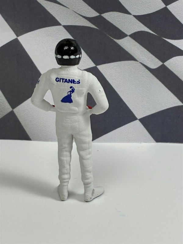 a toy figure with a helmet on
