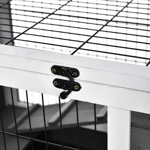 White wooden guinea pig hutch hinge hardware with black brackets on wire frame