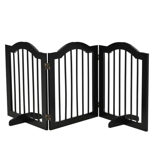 Black foldable pet gate with arched top and vertical bars, freestanding on support feet