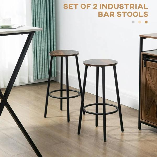 Two industrial bar stools with round rustic brown seats, black steel legs, and circular footrest