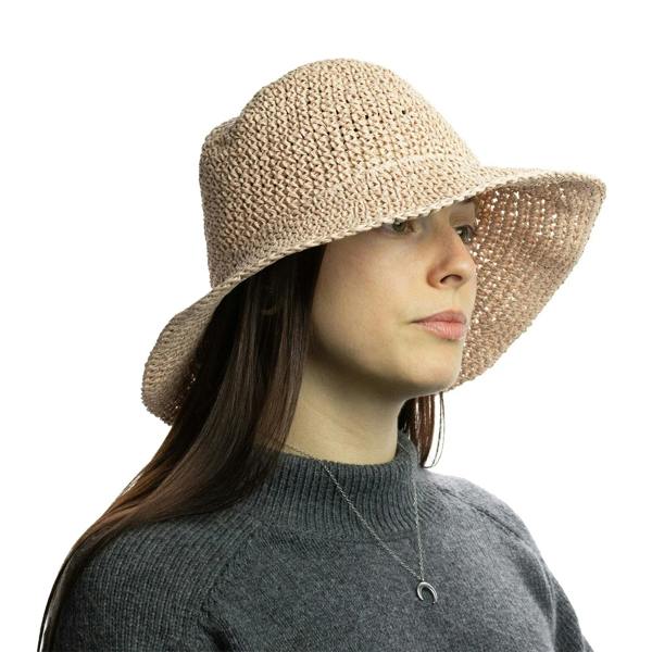 Rose blush straw sun hat with wide brim and textured weave, side view on model
