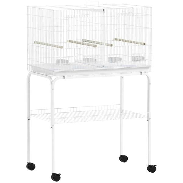 White bird cage with divider, four wooden perches and slide-out tray, on wheeled stand