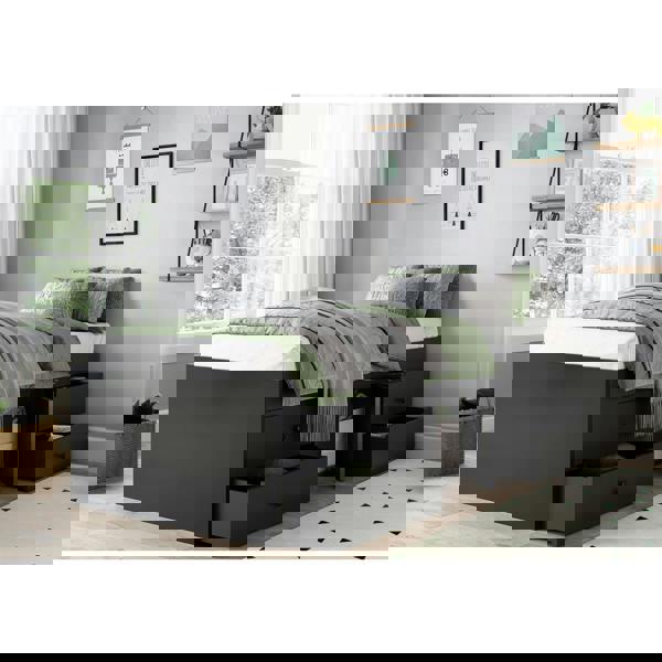 Bed frame in a modernly decorated bed room.