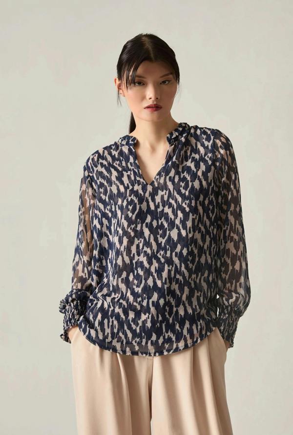 Navy abstract print blouse on invisible mannequin front view relaxed fit