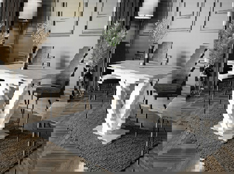 MASIV extending dining table 4-6 seater with grey concrete top and white base.