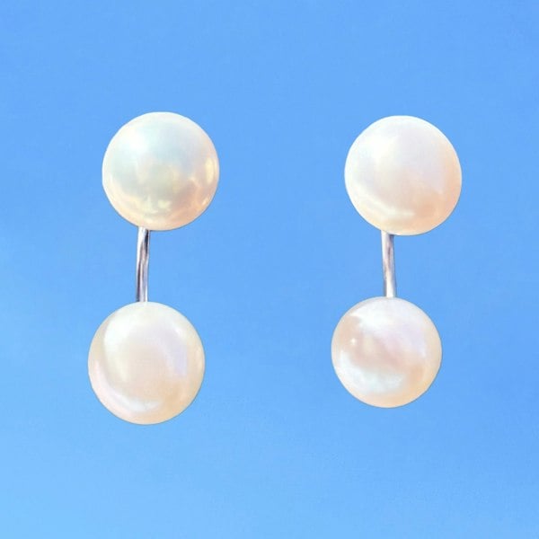 Double pearl ear jacket earrings crafted from sterling silver by LENAE London.