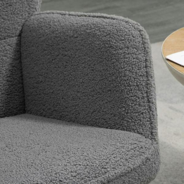 Dark grey thick padded armrest and seat upholstery with textured Berber fleece