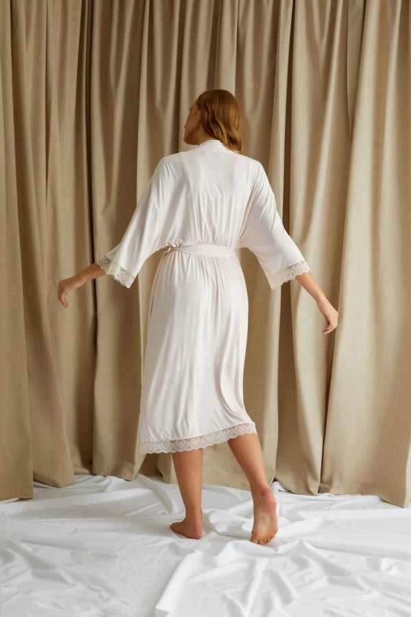 Women's Bamboo Lace Kimono Robe in Powder Puff Pink with delicate lace trims and deep pockets from Pretty You London