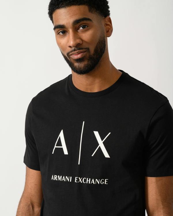 Detail shot of a Model wearing a Armani Exchange Mens T-Shirt in Black
