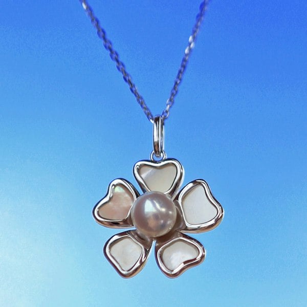 Floral mother-of-pearl and freshwater pearl silver necklace.