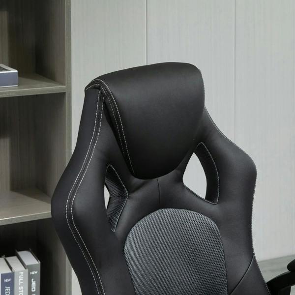 Black faux-leather office chair back with stitched edges and textured center panel