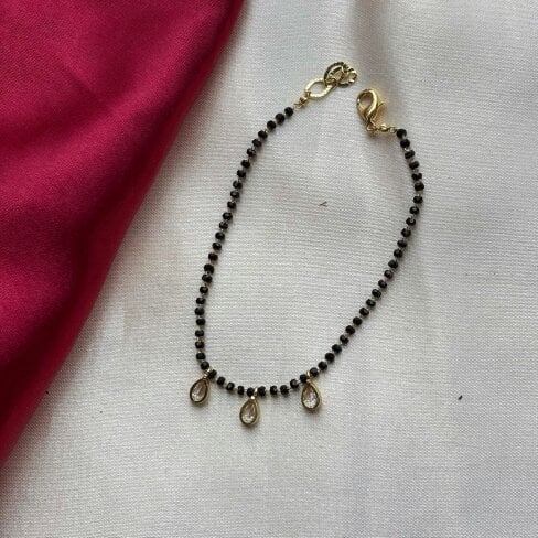 The Colourful Aura Elegant Black Beaded Nazar mangalsutra Dangle Zircon Bracelet
