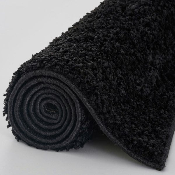 Black shaggy Rug Plain design thick pile, high quality, soft & durable.