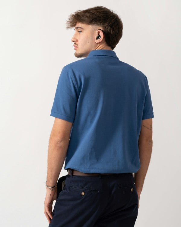 back shot of a Model wearing a GANT Mens Regular Fit Short Sleeve Shield Logo Pique Polo in Vintage Blue