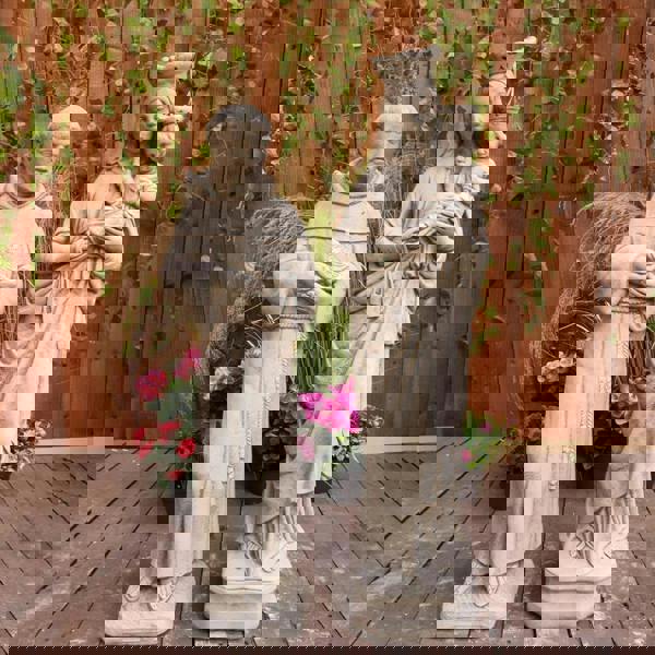 Stone Cast statues of Mary with Child and St Francis