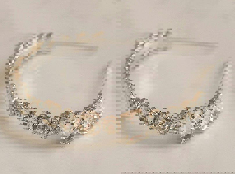silver headband with crystal side 
