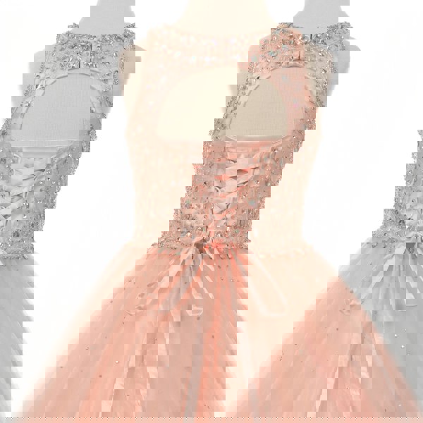 ribbon tie detail on the back of a girls dress