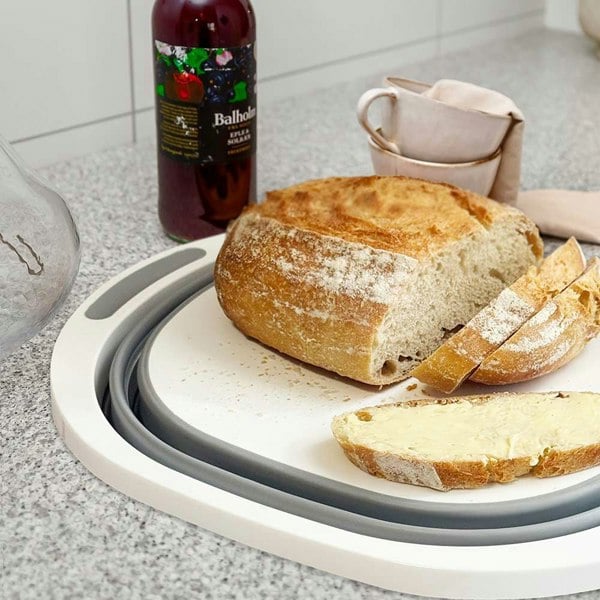 Collapsible Silicone Folding Bowl with Cutting Board OLPRO - on kitchen side with bread on