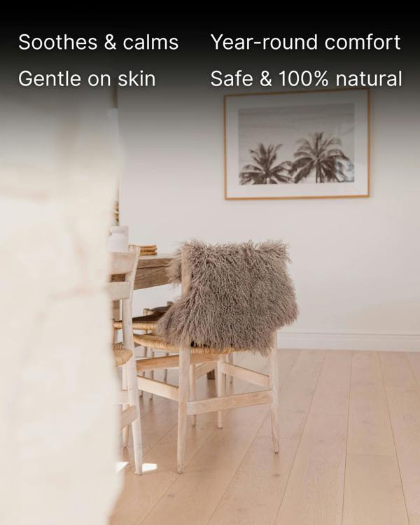 Mocha Mongolian Sheepskin Rug drapped on back off chair