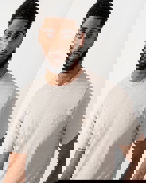 close up shot of a model wearing a BOSS Orange Tales Mens Cotton-Jersey T-shirt With Logo Patch in Open Grey