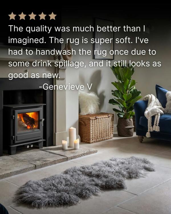 Grey Mongolian Sheepskin Rug in front of fireplace