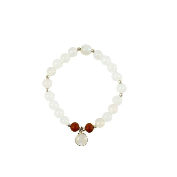 Selene purity mala bracelet by Kati Kaia with white beads, brown accents, and central pendant