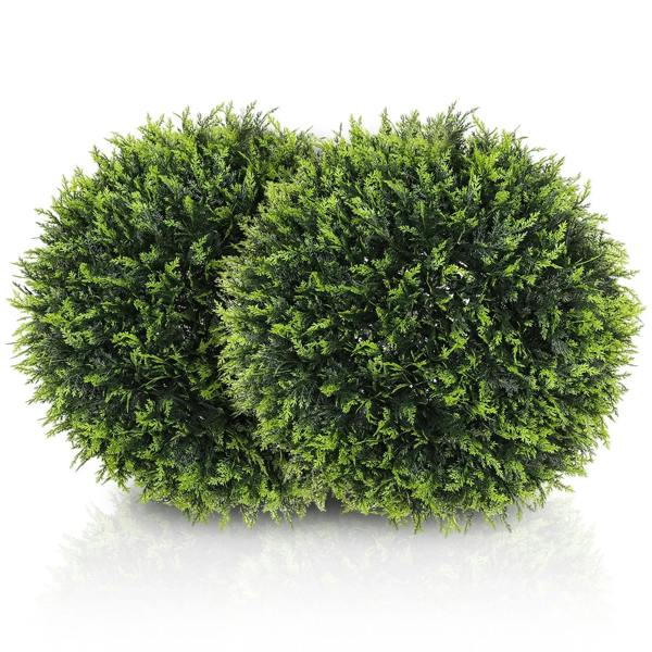 Artificial green topiary ball with dense faux leaves, rounded shrub shape.