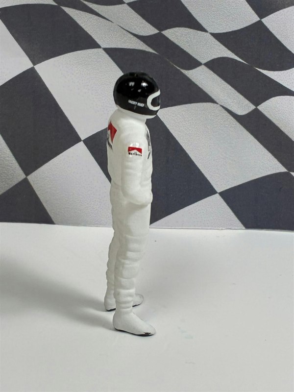 a toy astronaut in a helmet