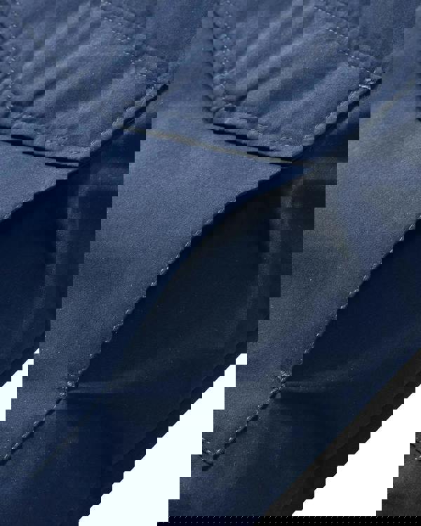 Lambretta Mens Padded Hooded Classic Badge Jacket Coat, close-up view of navy blue padding and stitched pocket detail.