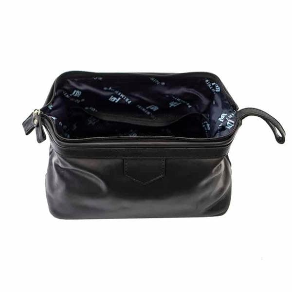 Open view of Black leather washbag on a white background