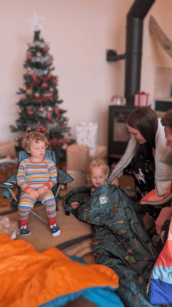 Kids Patterned Sleeping Bag by OLPRO pictured as Ideal Christmas gift, lifestyle with a family.