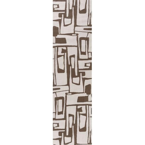 Rectangular mat with brown abstract geometric pattern on a white background