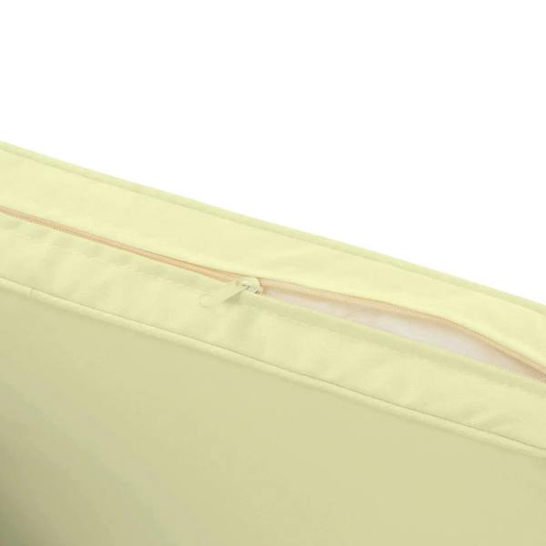 Cream cushion cover close-up with seam and hidden zipper detail