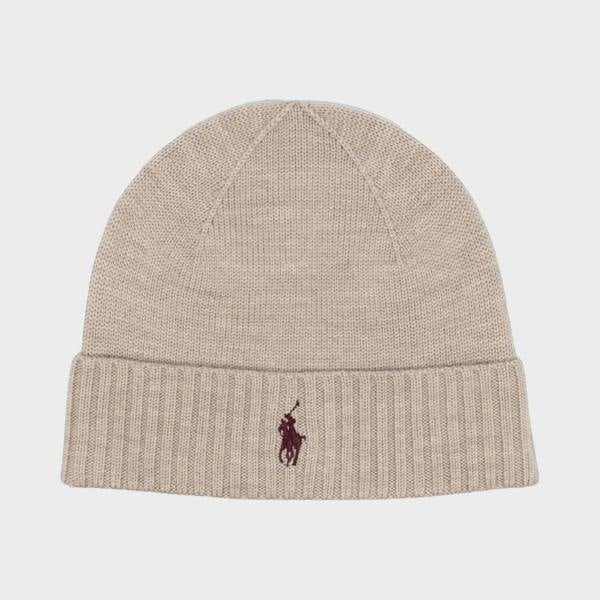 Supplied Fashion natural beige wool beanie with a dark embroidered logo on the ribbed cuff