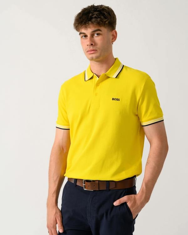 detail shot of a model wearing a BOSS Green Paddy Mens Cotton-Piqué Polo Shirt with Contrast Logo in Bright Yellow 739