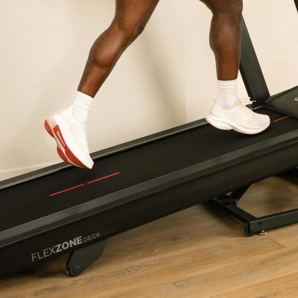 Close-up of the BowFlex T6 treadmill running deck and cushioning system.