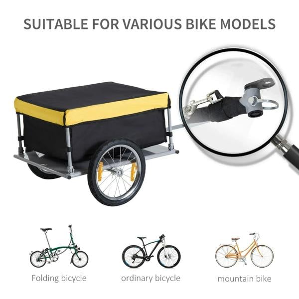 Two-wheel cargo trailer with yellow-and-black fabric cover and large wheel, tow-ready design