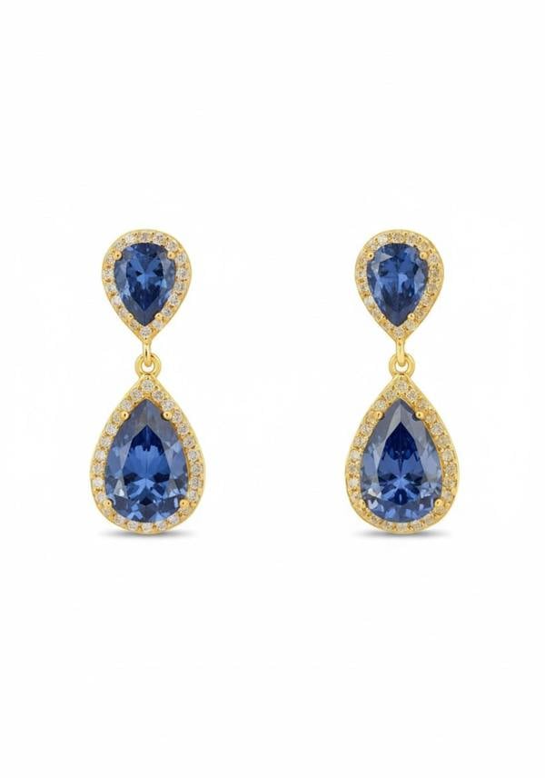 Pair of gold earrings with blue gemstones on a white background