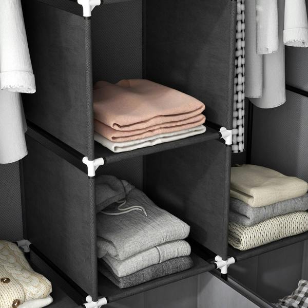 Dark grey closet shelf with folded linens and hanging rod